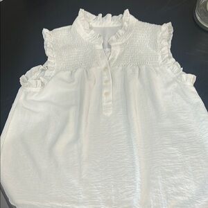 White Ruffled Sleeveless Blouse